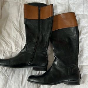 Tall black and brown boots.